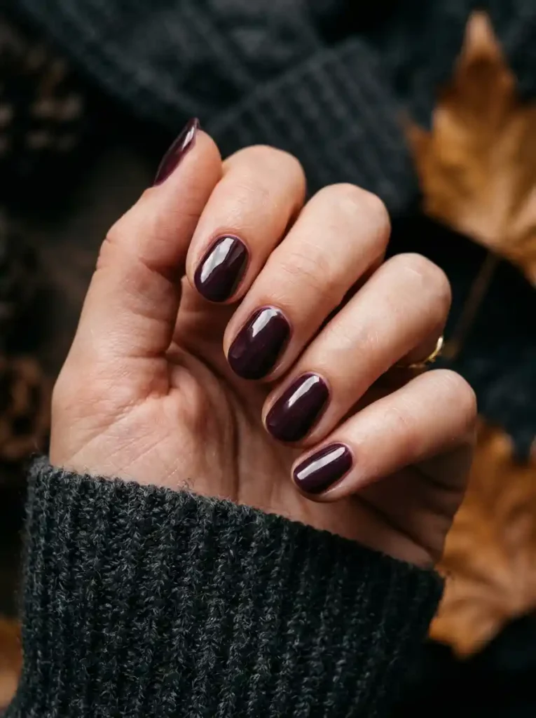 16. Deep Plum Gel Nails